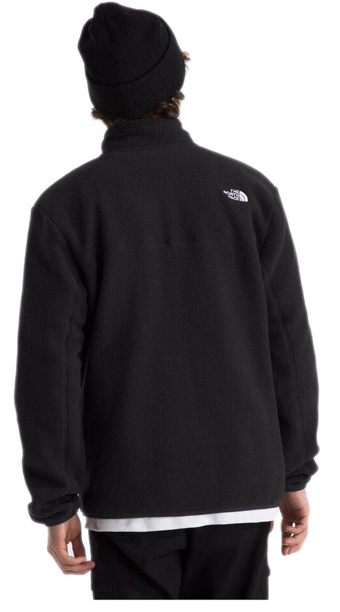 Black fleece jacket, mock neck, long sleeves, and logo on upper right shoulder. Black beanie.
