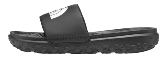 A black slide sandal with a white logo on the upper.