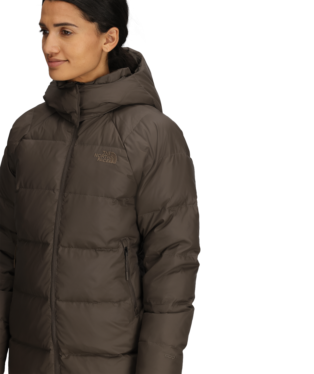 Woman wearing brown hooded puffer jacket.