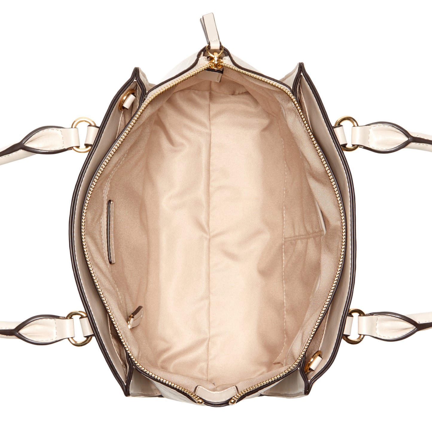 An overhead shot of the interior of a beige tote bag with two handles.