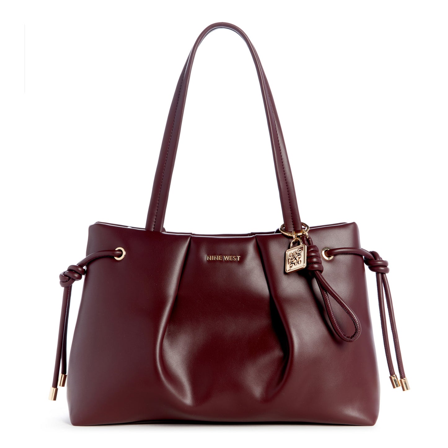 Red tote bag with top handles and lock charm.