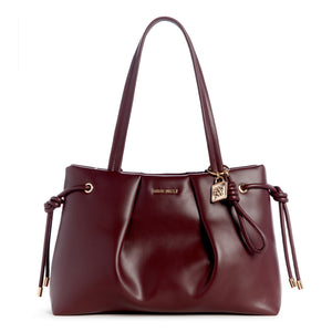 Red tote bag with top handles and lock charm.