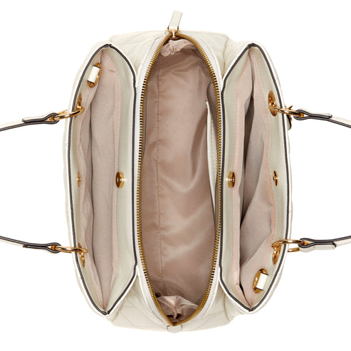 Open white quilted handbag with two interior compartments and two shoulder straps.