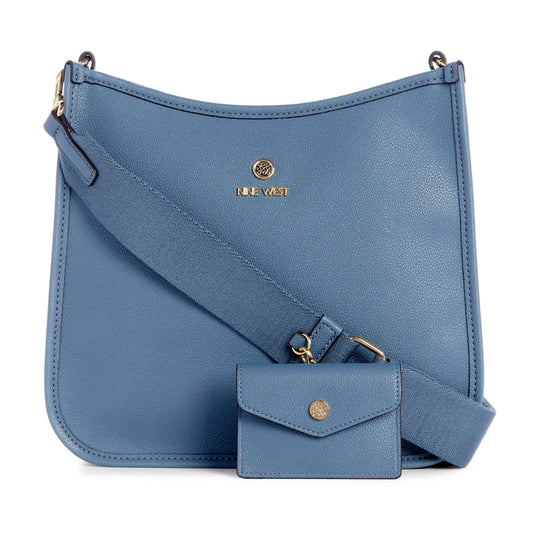 Blue crossbody bag with wide strap and matching coin purse, gold logo at the top center.