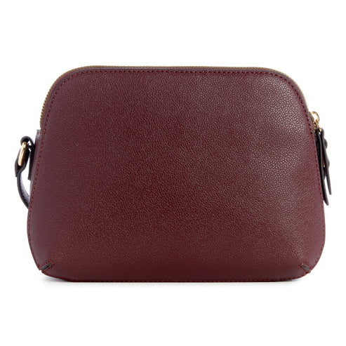 Burgundy leather crossbody bag with gold zipper.