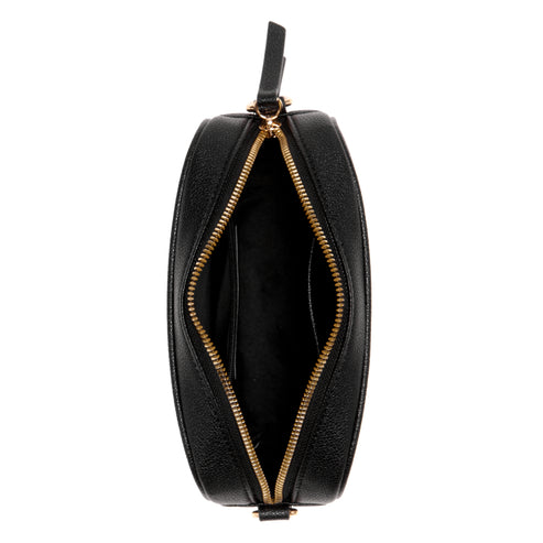 Black purse with gold zipper open, revealing the black interior.