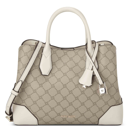 Satchel bag with a top handle, a shoulder strap, light beige pattern, white handle, and white accents.