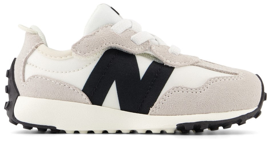 A low top white and gray sneaker with a black N on the side and black sole.
