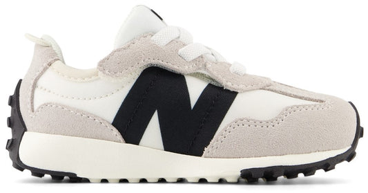 A low top white and gray sneaker with a black N on the side and black sole.