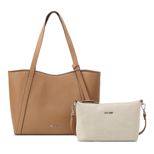 Tote bag with a light brown exterior next to a small beige cross body bag with a silver logo.