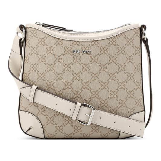 Shoulder bag with geometric pattern and white adjustable strap. NINE WEST text on the top of the bag.