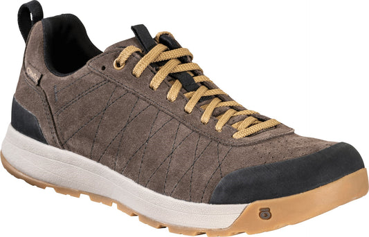 A brown suede sneaker with a white midsole and tan gum rubber outsole, featuring tan laces, black accents at the toe, heel, and collar, and stitched diamond patterns along the side.