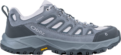 A gray and light gray Oboz B-DRY hiking shoe with a rugged Vibram sole, mesh panels, and a pull loop at the heel, viewed from the side.