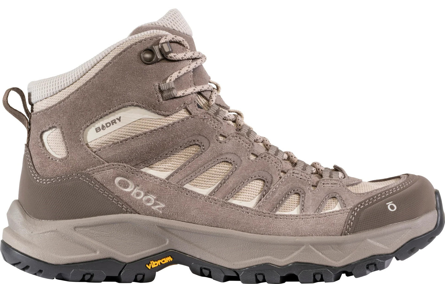 A light brown suede and mesh waterproof hiking boot with a lace-up closure, a cushioned collar, 'B-DRY' branding on the side, and a thick, lugged Vibram rubber sole.
