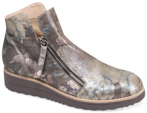 Ankle boot with floral pattern and side zipper.