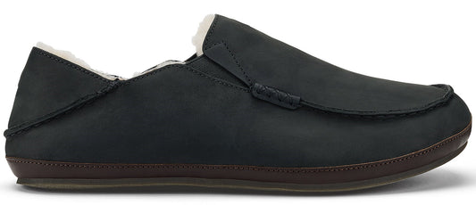 A black slip-on shoe with brown sole and white fur lining.