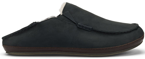 A black leather men's loafer with brown sole and white inside.