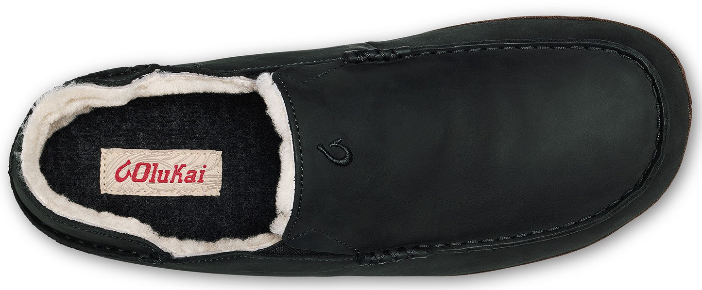 A black slipper with light-colored furry interior trim and a logo.