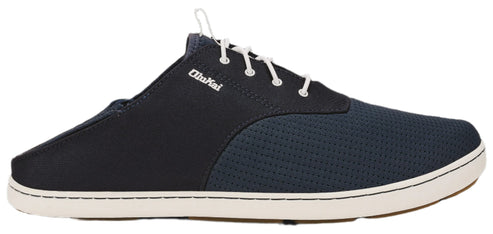 A slip-on shoe with white laces and the text "OluKai".