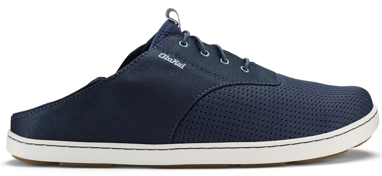 A navy blue shoe with white soles.