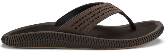 Brown flip-flop with perforated strap and thick sole.
