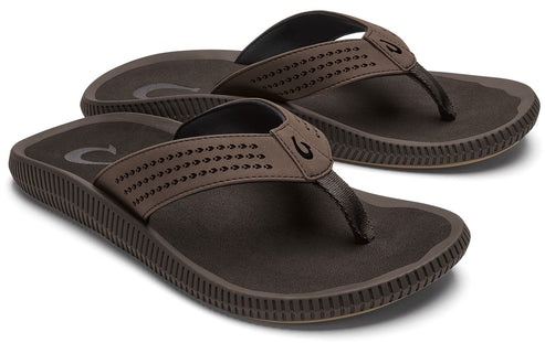 A pair of dark brown flip flops with perforated straps and toe posts.