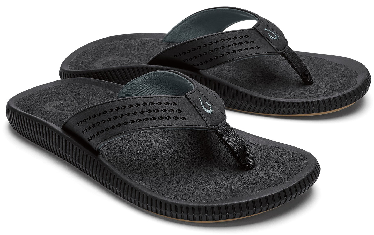 Pair of black flip-flops with perforated straps.