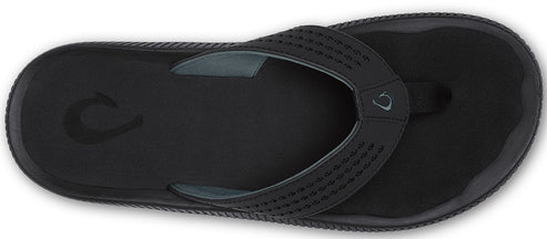 Black flip-flop sandal with perforated strap.