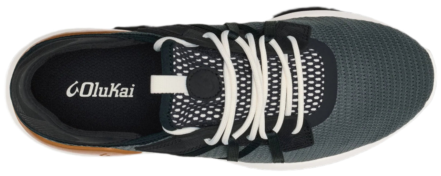 A top-down view of a laced shoe with a dark mesh toe.