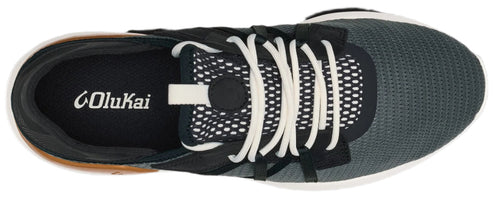 A top-down view of a laced shoe with a dark mesh toe.