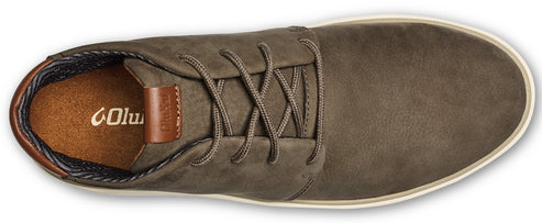 Overhead shot of a laced shoe with a brown insole and olive green outer.