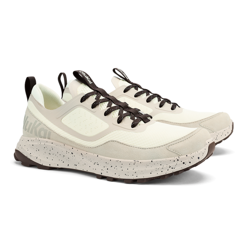 Beige sneaker with speckled sole and dark laces.