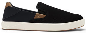 A black slip-on shoe with a tan accent near the opening.