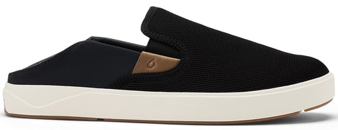 A black slip-on shoe with a beige sole.