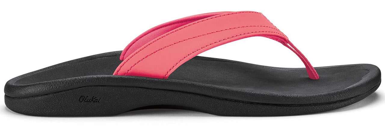 A pink and black flip-flop.
