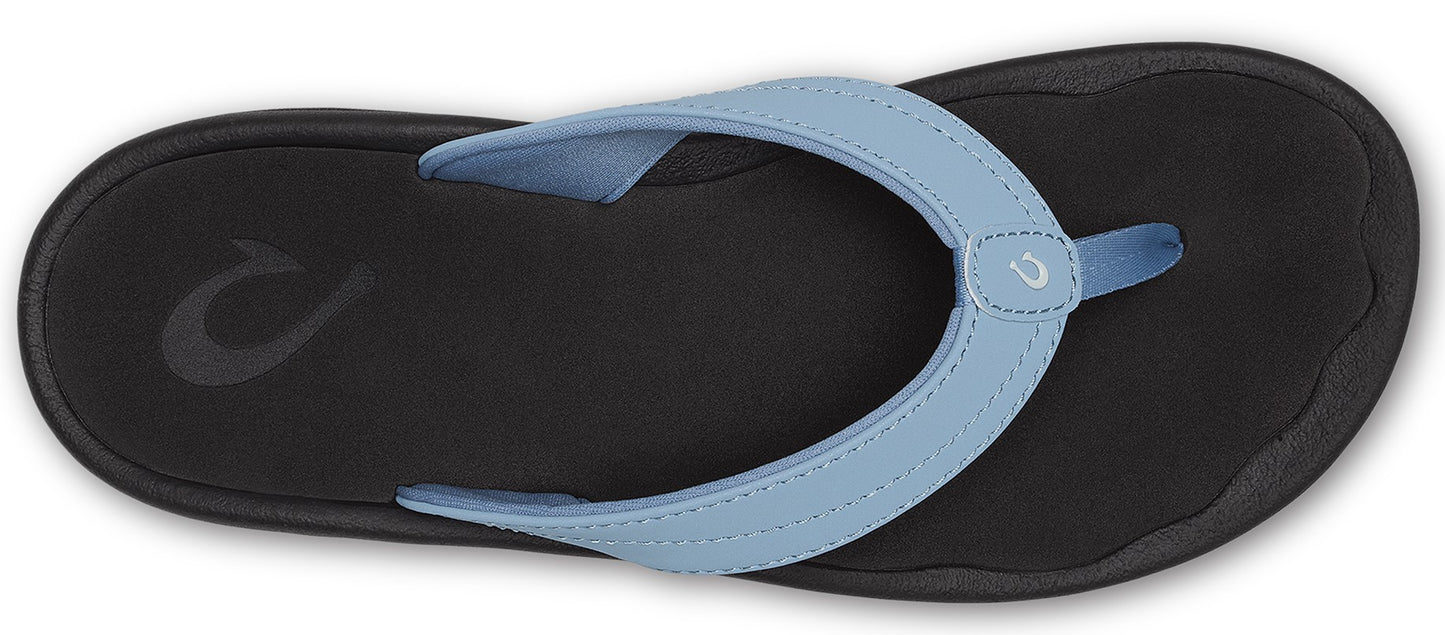 A blue and black sandal.