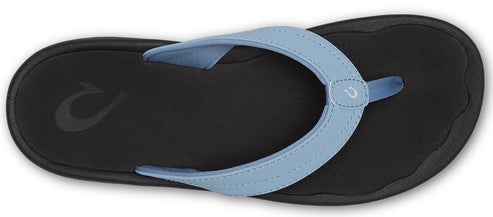 A blue and black sandal.