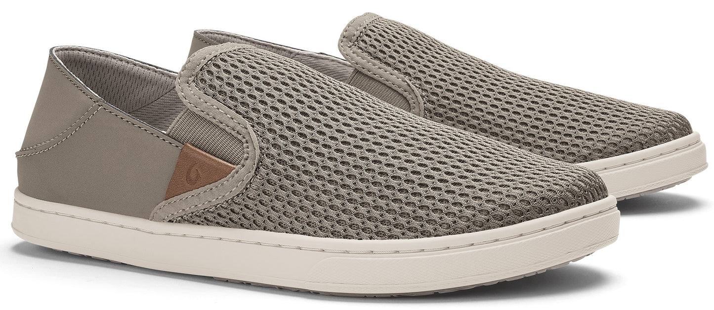 A pair of slip-on sneakers with khaki mesh uppers and white soles.