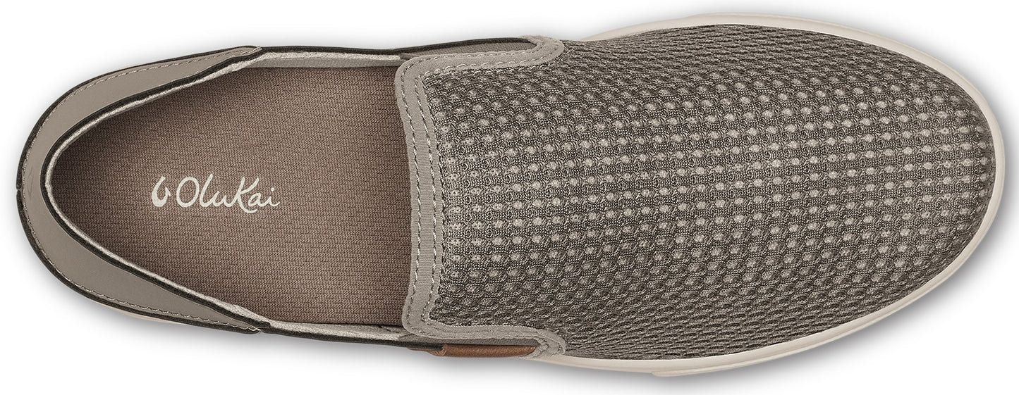 An overhead view of a gray Olukai slip-on shoe.