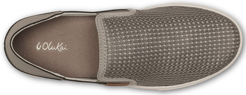 An overhead view of a gray Olukai slip-on shoe.