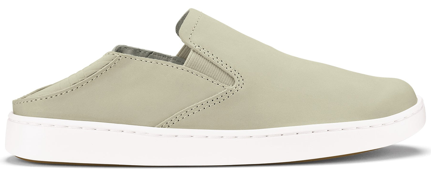 A slip-on shoe in muted green with a white sole.