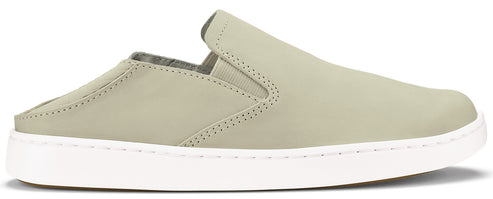 A slip-on shoe in muted green with a white sole.
