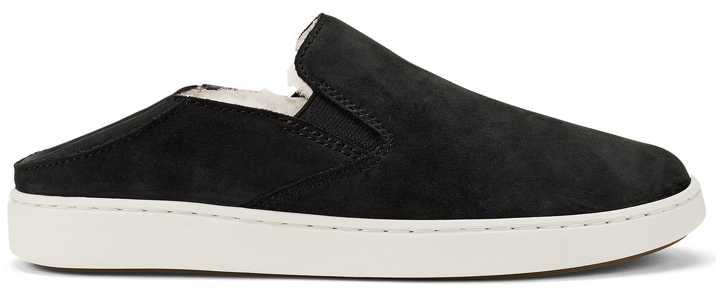 A black slip-on shoe with a white sole.