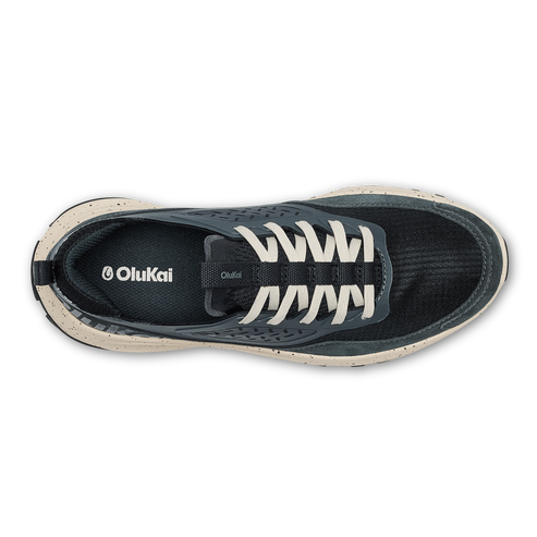 Top-down view of a dark gray running shoe with white laces.