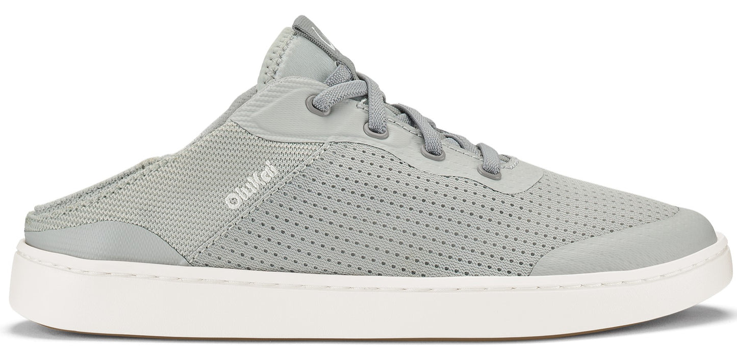 A gray, laced OluKai slip-on shoe with a white sole.