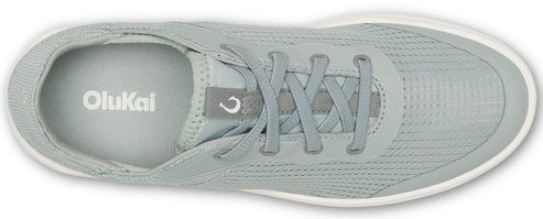 A top view of light grey Olukai shoe with white sole and laces.