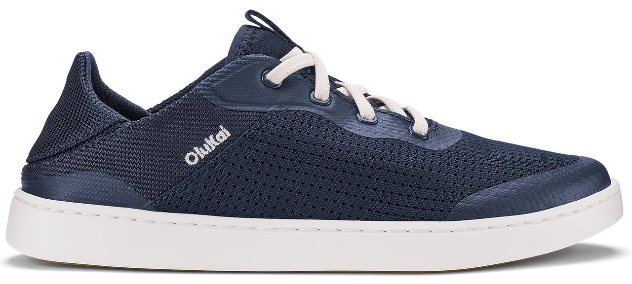 Navy blue lace up sneaker with white soles.