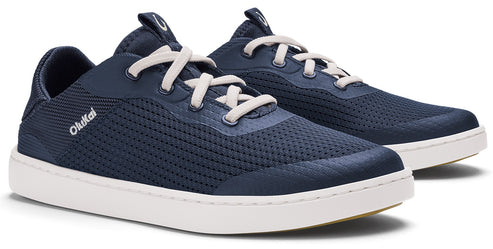 Pair of dark blue casual athletic shoes with white laces and soles.