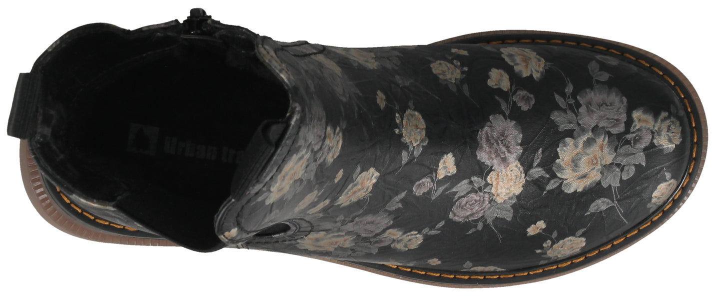 A top-down view of a black floral print boot.