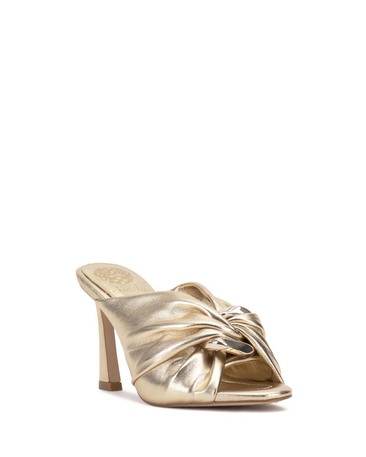Gold high heel mule with a twisted knot detail on the upper.